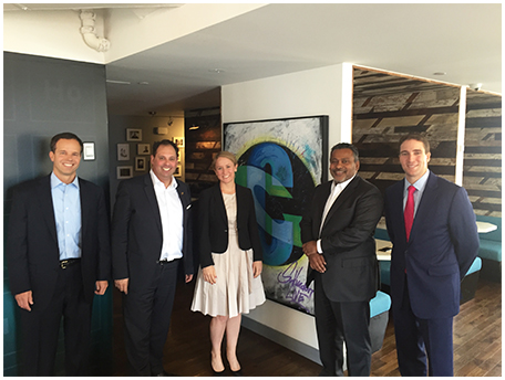 Minister Philip Dalidakis (second from left) and Cognizant's Gajen Kandiah (second from right) in New York