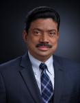 Raj Radhakrishnan, Senior Vice President and Head of Manufacturing, Logistics, Energy and Utilities at Cognizant